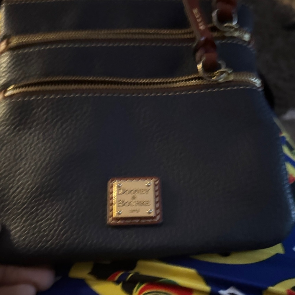 Dooney & Bourke Dark Gray Crossbody Bag with Gold Accents